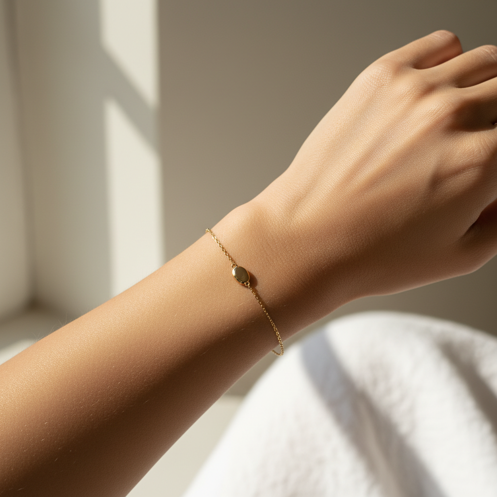 a square image of one woman wearing a simple gold bracelet